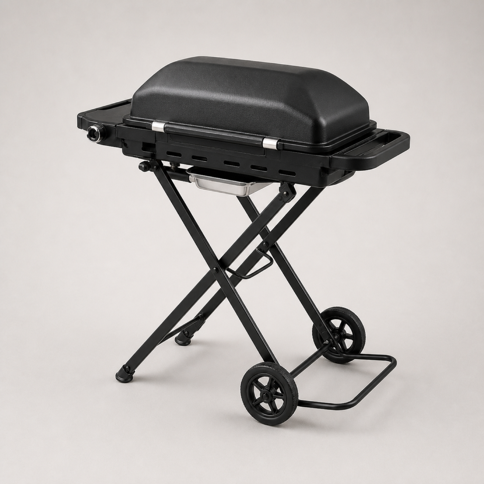 Portable gas BBQ grill viewed from another angle showing compact outdoor cooking body