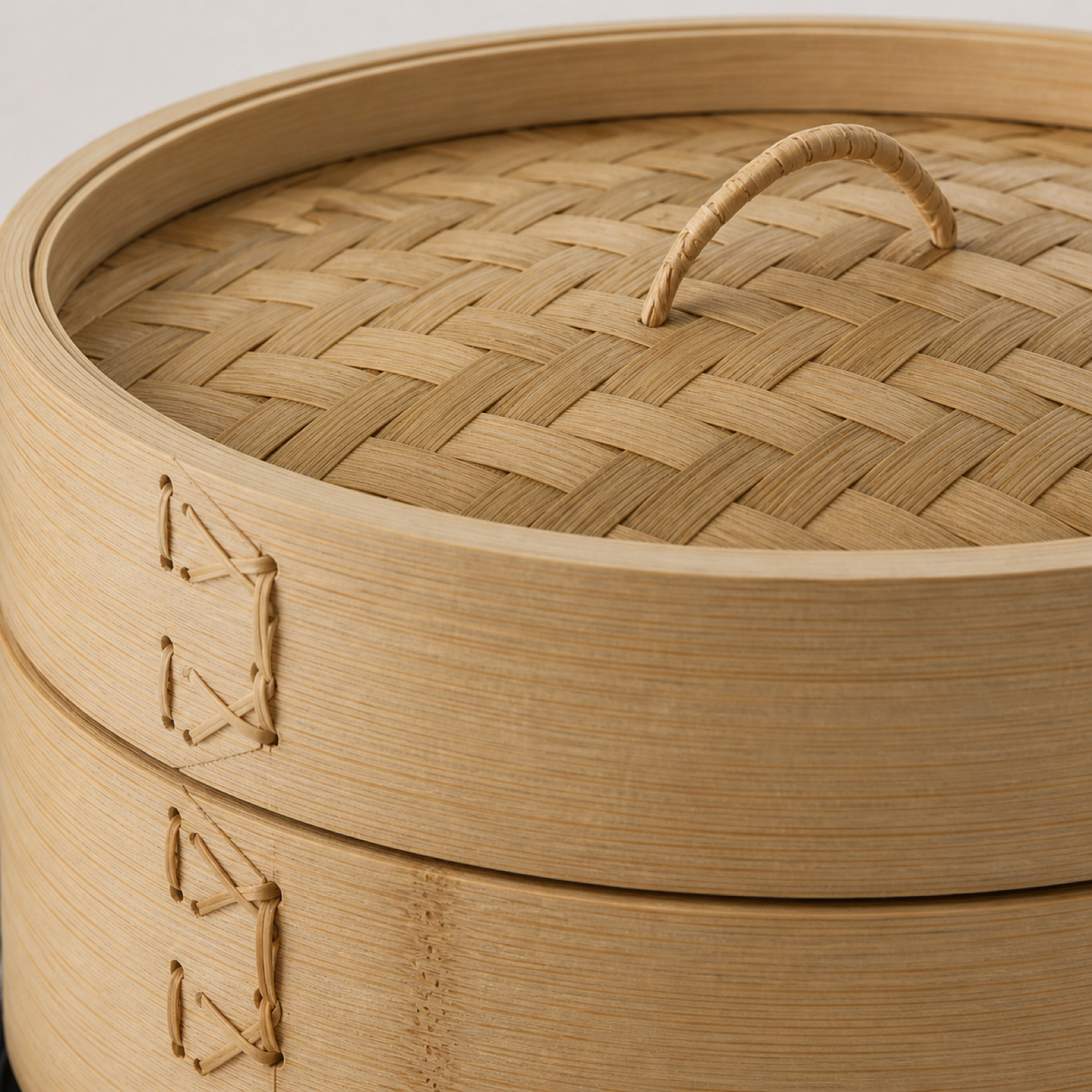 Natural bamboo weaving and texture detail on electric bamboo steamer