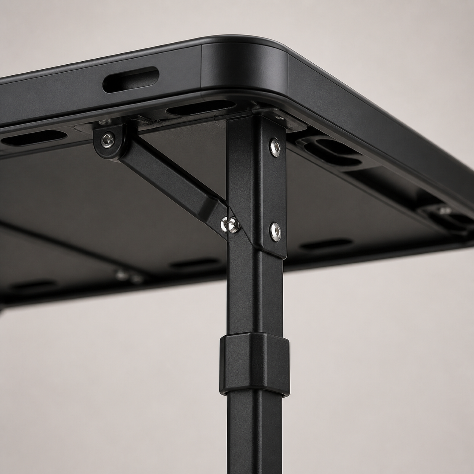 Height adjustment and support structure detail of tactical camping table
