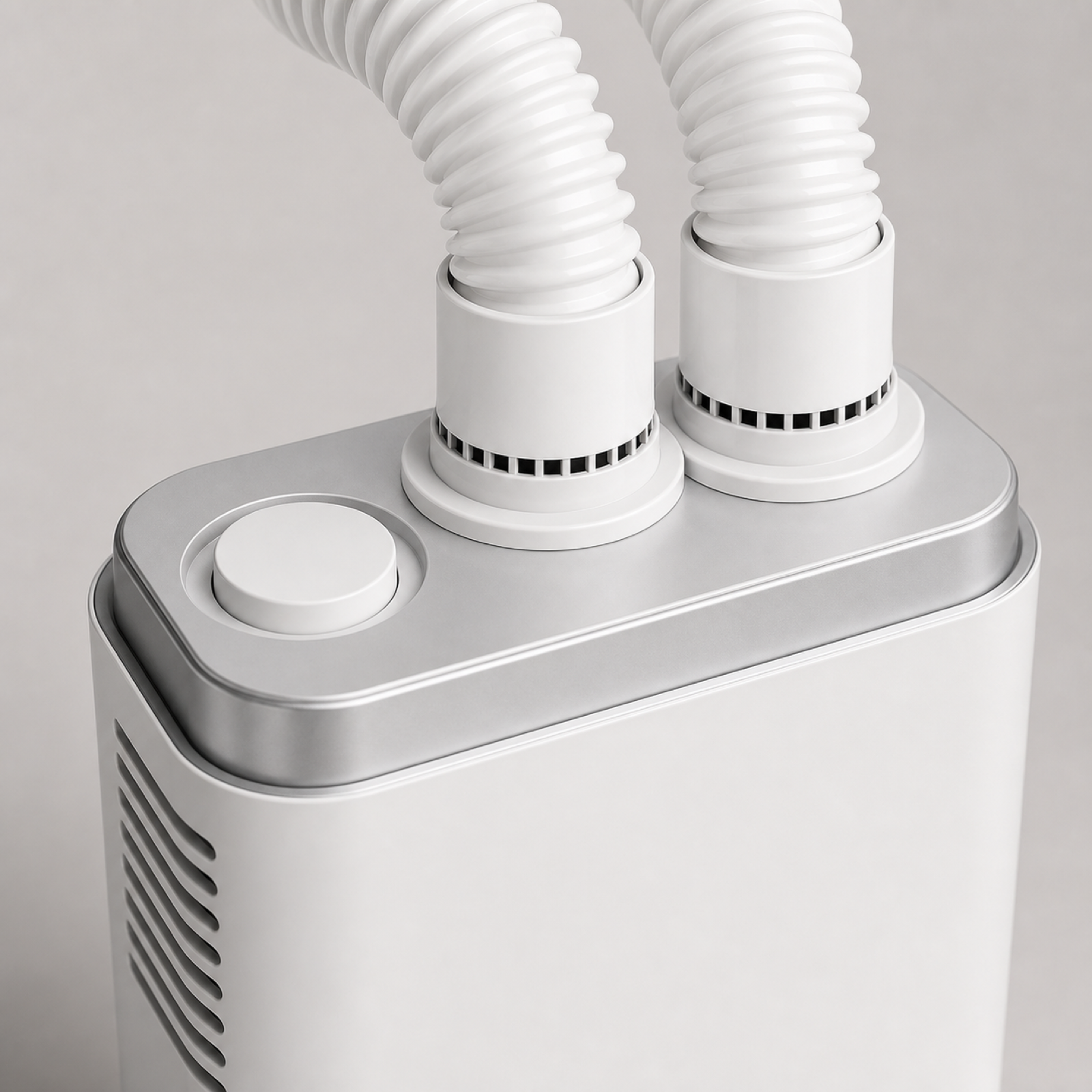 Dual flexible hose connection detail on portable clothes and shoe dryer