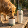 06_场景图_户外休息喂食 3-in-1 Portable Pet Travel Water Bottle with Food Container & Waste Bag Dispenser